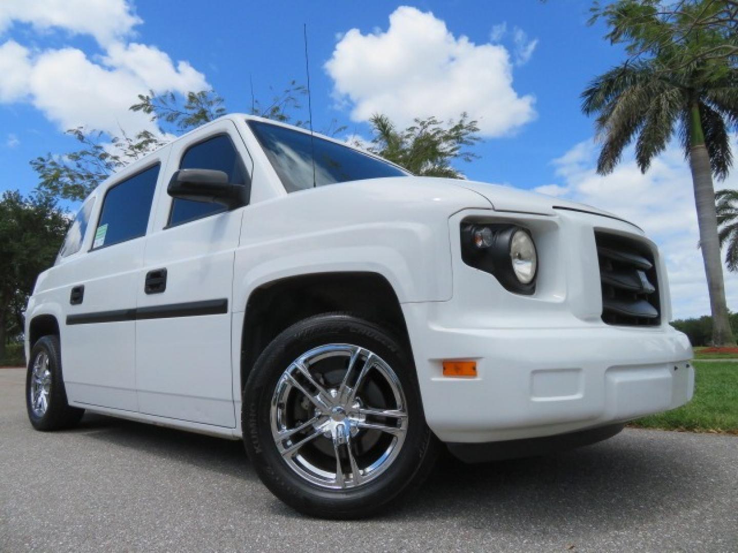 2012 White /Black with an 4.6L V8 engine, Automatic transmission, located at 4301 Oak Circle #19, Boca Raton, FL, 33431, (954) 561-2499, 26.388861, -80.084038 - You are looking at a Gorgeous 2012 Mobility Ventures MV1 Handicap Wheelchair Conversion Van with 64K Original Miles, 4.6L Ford V8, Bleack Leather Type Interior, Alloy Wheels, Power Side Entry Wheelchair Lift with Long Ramp and Short Ramp Function, Q Lock 150 EZ Lock, L-Track Tie Down System, Back Up - Photo#3